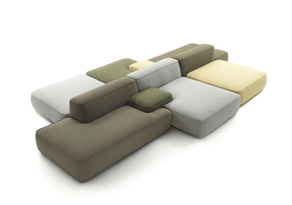 Sofá modular nas cores cinza, amarelo e verde, visto de cima em um fundo branco.