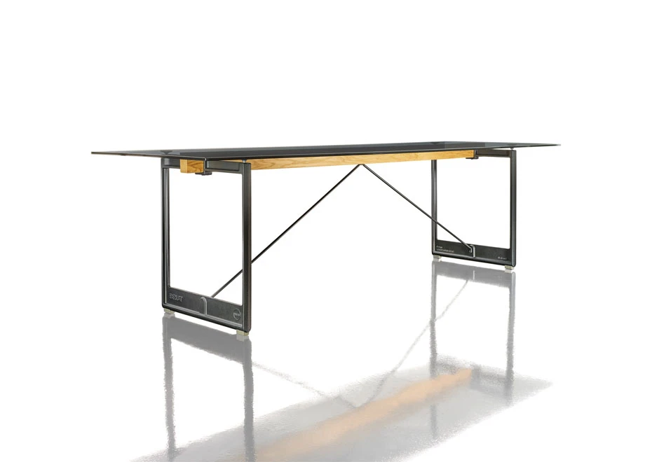 Mesa Brut com estrutura de ferro fundido pintado em poliéster e tampo de vidro transparente ou fumê - foto 1