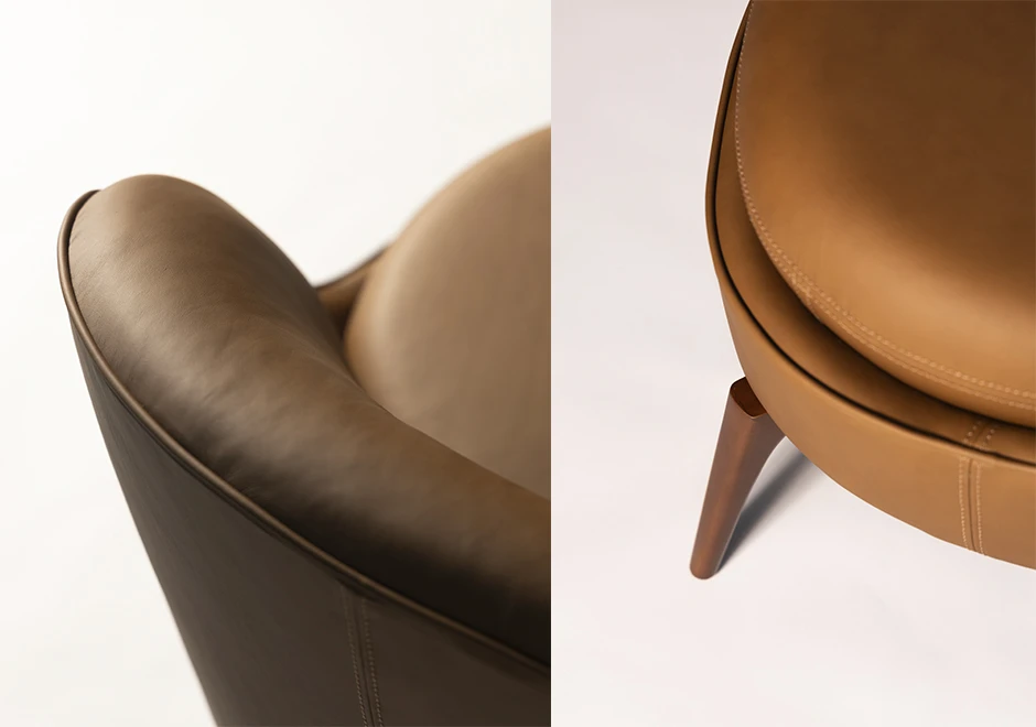 Detalhes da poltrona Bromélia em couro caramelo, destacando costuras refinadas, curvas do encosto e pés em madeira maciça para um toque sofisticado.